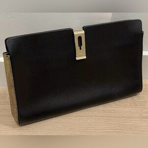 ANYA HINDMARCH Black and Gold Leather Clutch Bag